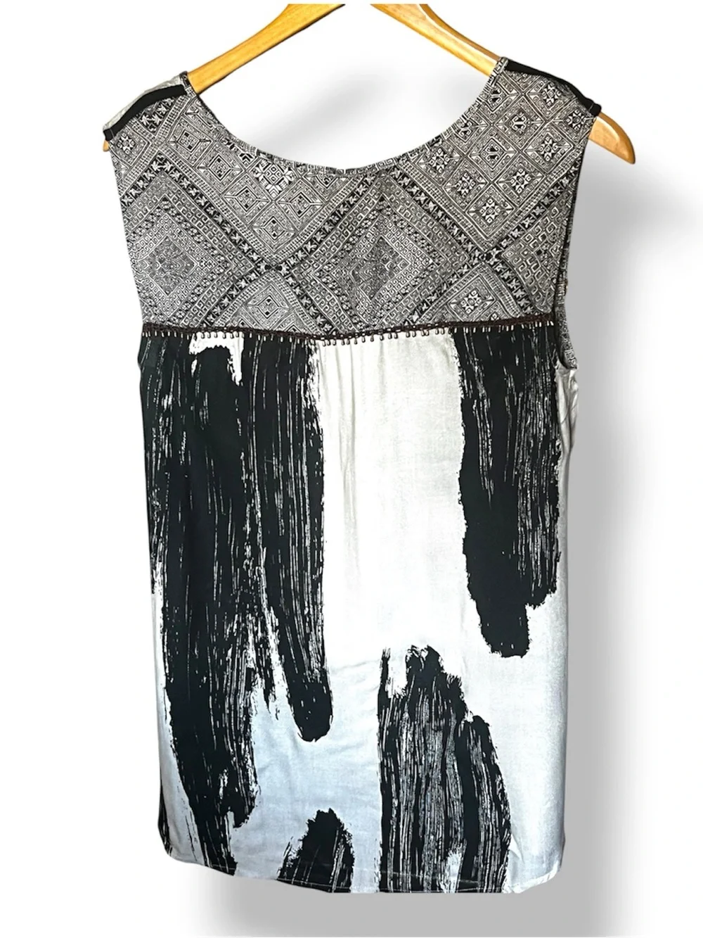 Free People Black and Cream Printed Sleeveless Blouse sequined in front.